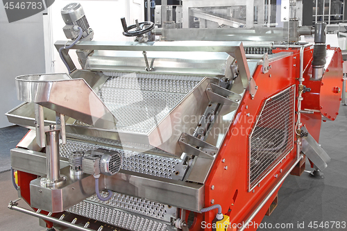 Image of Pitting Machine