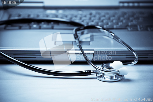 Image of Stethoscope and laptop