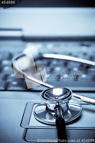 Image of Stethoscope and laptop