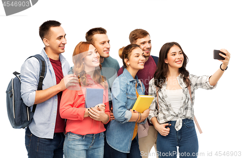 Image of group of students taking selfie by smartphone