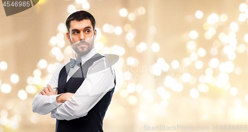 Image of man in party clothes and bowtie