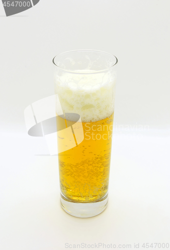 Image of Glass of beer on a light background