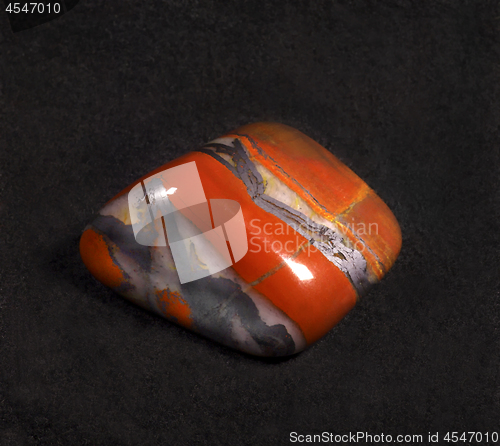 Image of Jasper polished stone on black background