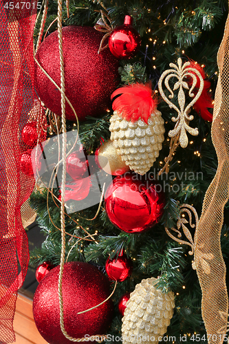 Image of Beautiful Christmas decoration with balls, cones and ribbons