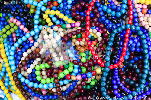 Image of Colorful bright beads, close-up background