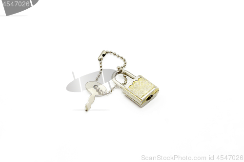 Image of Padlock and key for bag or suitcase on white background