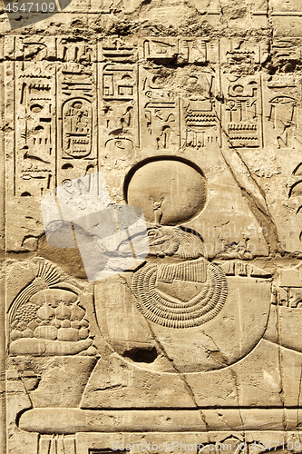 Image of Ancient stone wall with Egyptian hieroglyphs