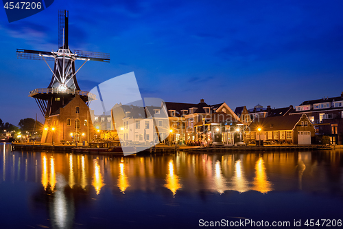 Image of Harlem landmark windmill De Adriaan on Spaarne river. Harlem,