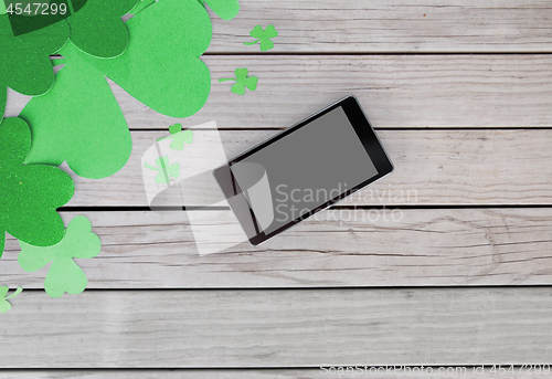 Image of tablet pc and st patricks day decorations