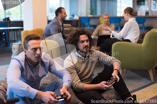 Image of startup Office Workers Playing computer games