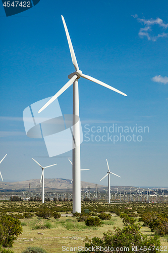 Image of Dramatic Wind Turbine Farm in the Desert of California.