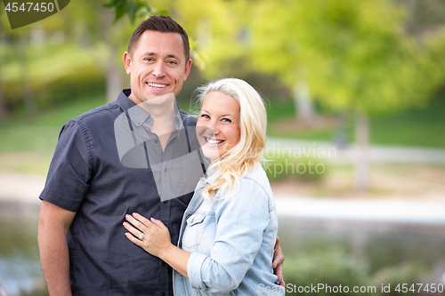 Image of Young Caucasian Couple Portrait In The Park
