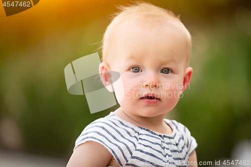 Image of Adorable Infant Girl Child Portrait Outdoors