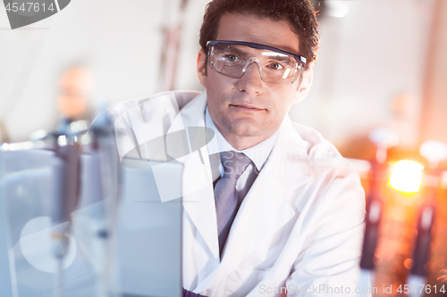 Image of Portrait of an engineer in his working environment.