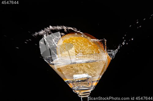 Image of Orange, Glass, Ice And Water