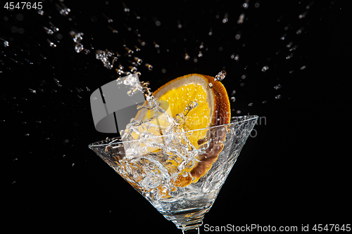 Image of Orange, Glass, Ice And Water