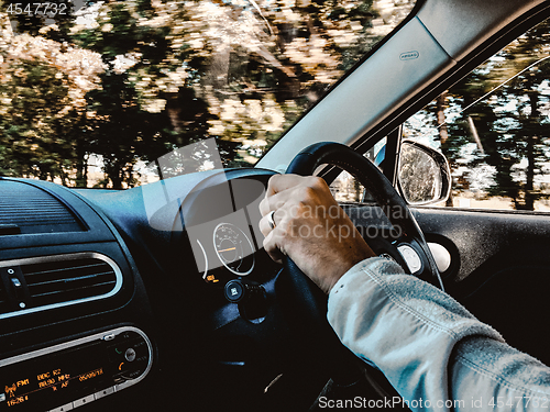 Image of Man in car with Seatbelt