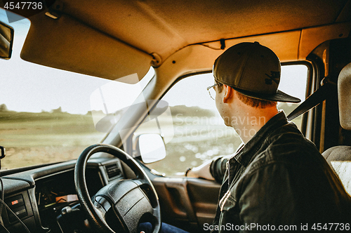 Image of Man in car with Seatbelt