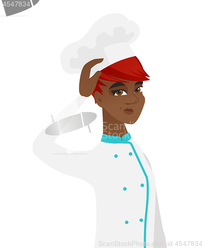 Image of Young african-american chef scratching her head.