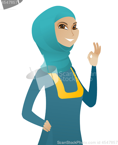 Image of Young muslim business woman showing ok sign.