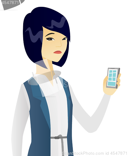 Image of Disappointed asian business woman with cellphone.