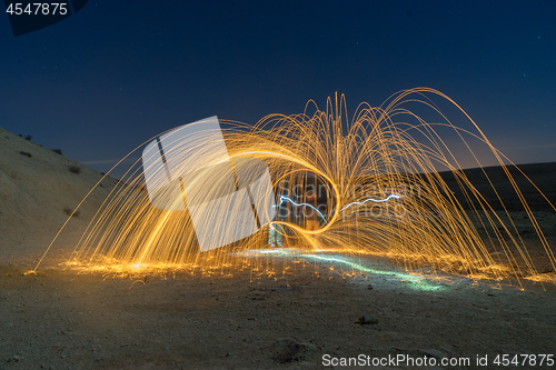 Image of Light painting in desert