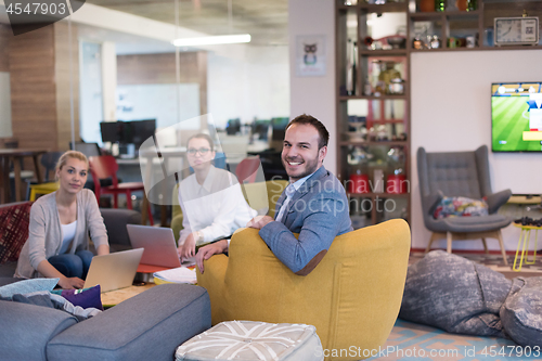 Image of Startup Business Team At A Meeting at modern office building