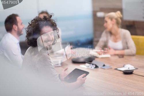 Image of Startup Business Team At A Meeting at modern office building