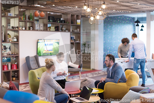 Image of Startup Business Team At A Meeting at modern office building