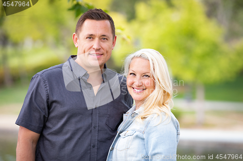 Image of Young Caucasian Couple Portrait In The Park