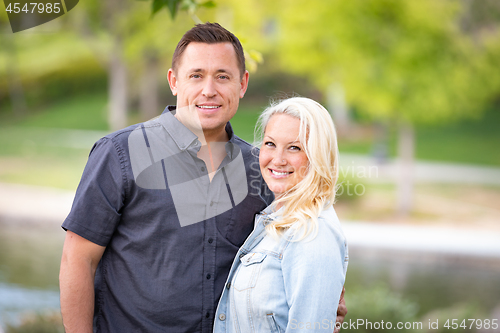 Image of Young Caucasian Couple Portrait In The Park