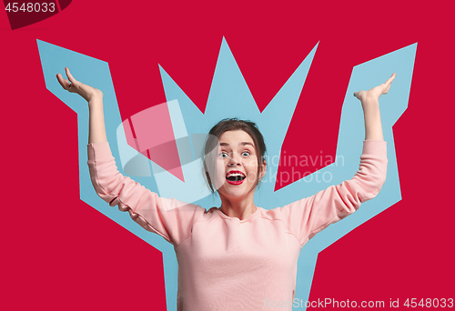 Image of Winning success woman happy ecstatic celebrating being a winner. Dynamic energetic image of female model