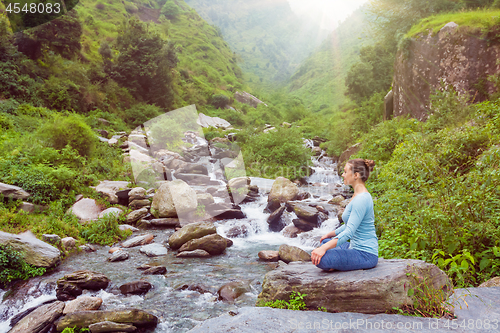 Image of Woman in Padmasana outdoors