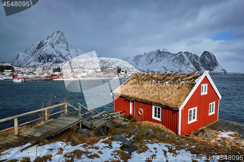 Image of Traditional red rorbu house in Reine village on Lofoten Islands,