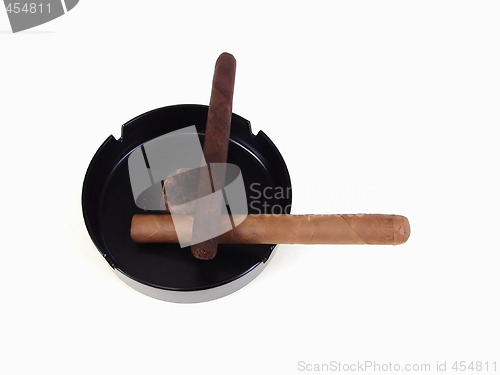 Image of Two Unlit Cigars with Ashtray