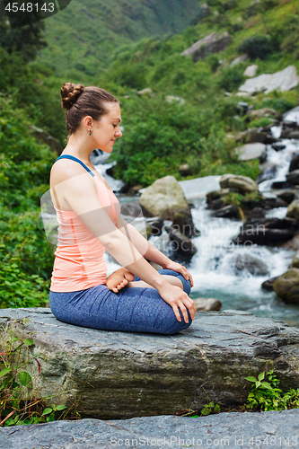 Image of Woman in Padmasana outdoors