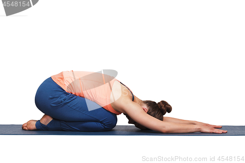 Image of Woman relax in Hatha yoga asana Balasana child pose