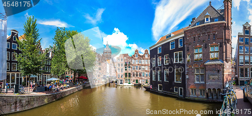 Image of Canal and St. Nicolas Church in Amsterdam