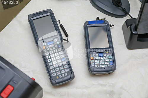 Image of Two Handheld Computers