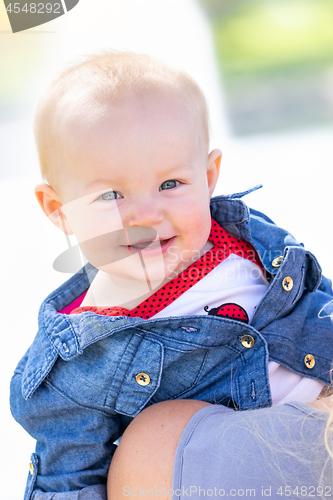 Image of Young Caucasian Mother and Daughter At The Park