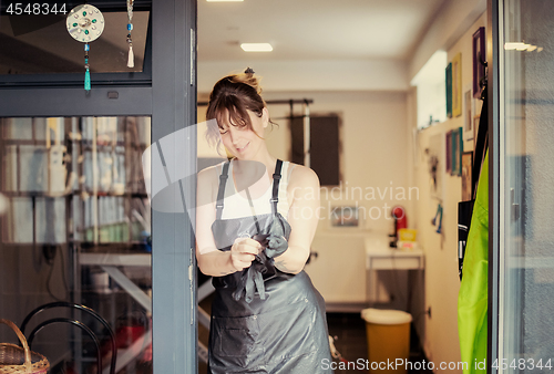 Image of portrait of professional pet hairdresser hipster woman