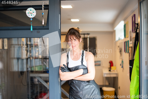 Image of portrait of professional pet hairdresser woman