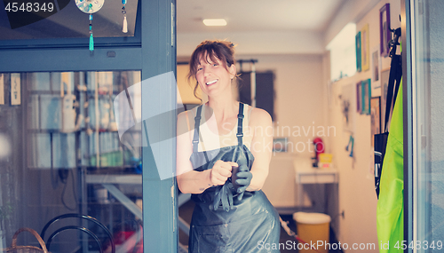 Image of portrait of professional pet hairdresser hipster woman