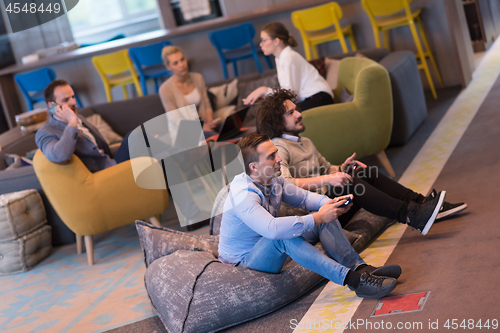 Image of startup Office Workers Playing computer games