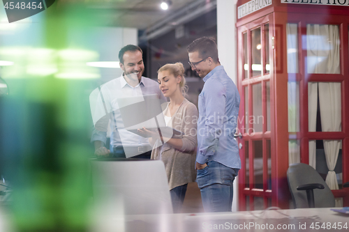 Image of Business team Working With laptop in creative office