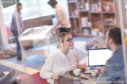 Image of startup Business team Working With laptop in creative office