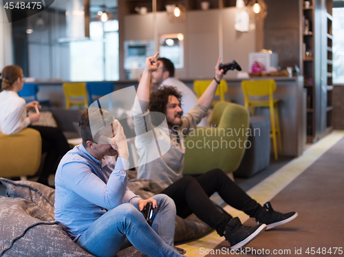 Image of startup Office Workers Playing computer games