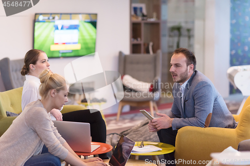 Image of Startup Business Team At A Meeting at modern office building