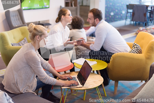 Image of Startup Business Team At A Meeting at modern office building