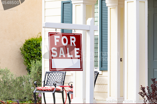 Image of Home For Sale Real Estate Sign in Front of New House